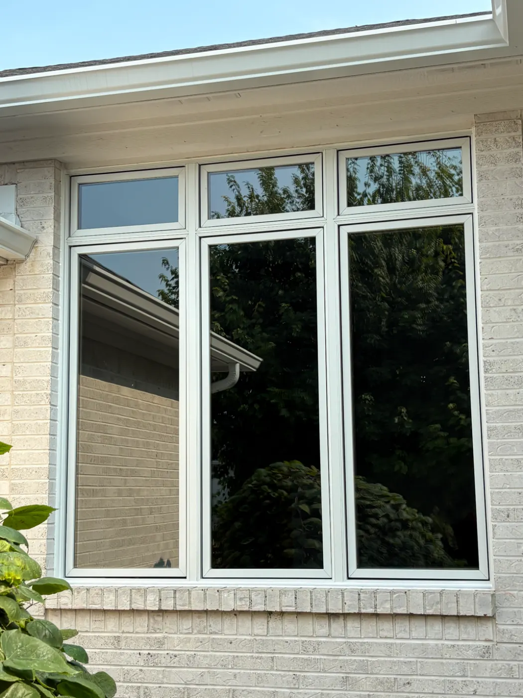 Storm-damaged window documented in Ravenswood